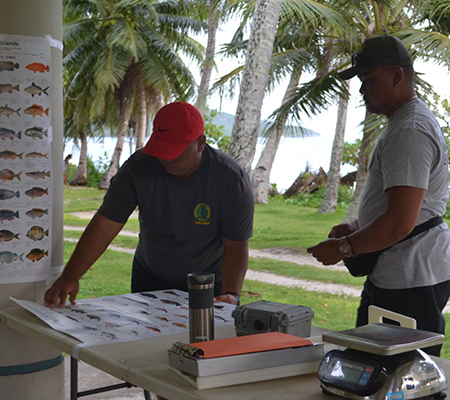 Staff from DLNR's Young Explorer's Program prepping for the Summer July Youth Fishing Derby